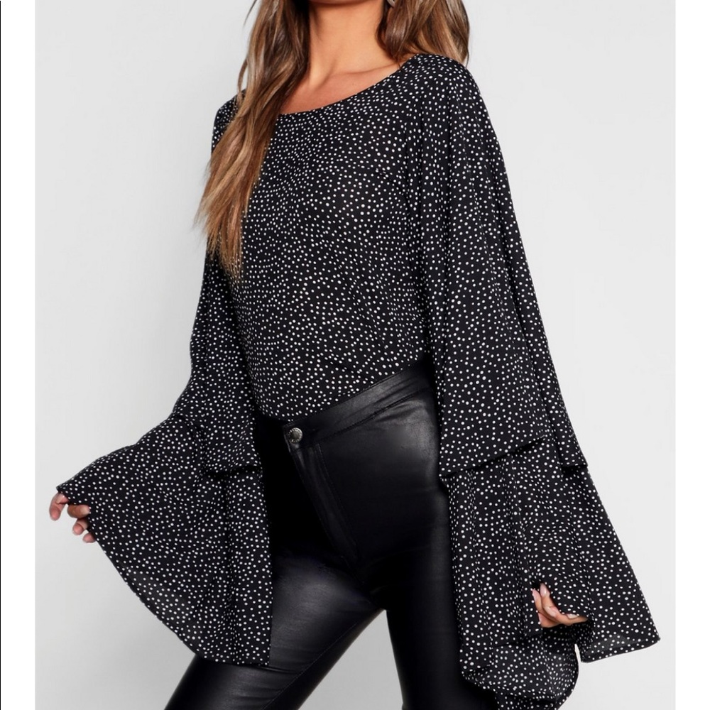 Black ruffle sleeve top
